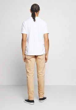 Diesel Hombre D YENNOX - Vaqueros Tapered - Beige -Ritmo Diesel Tienda 8712c6afa2054bcd88758afa898885a7