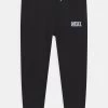 Diesel Unisexo LOGO UNISEX - Pantalones Deportivos - Grigio Melange