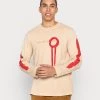 Diesel Hombre JUST - Camiseta De Manga Larga - Light Beige 1 Diesel Hombre JUST - Camiseta De Manga Larga - Light Beige -Ritmo Diesel Tienda b2a093702c4f4c638aa5e06ee025945b