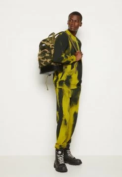 Diesel Hombre Pantalones Deportivos - Yellow/black -Ritmo Diesel Tienda b83911f9e72e444cb34197bc7caa8e60